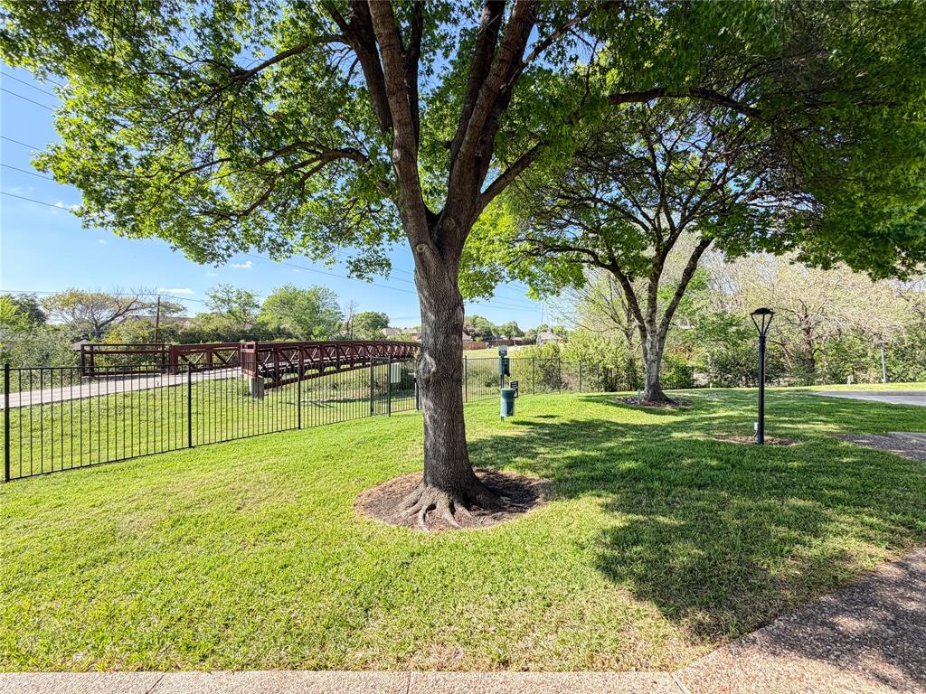 17490 Meandering Way, Unit 1102 Dallas, TX 75252 - Photo 35 of 40 View of a community green space