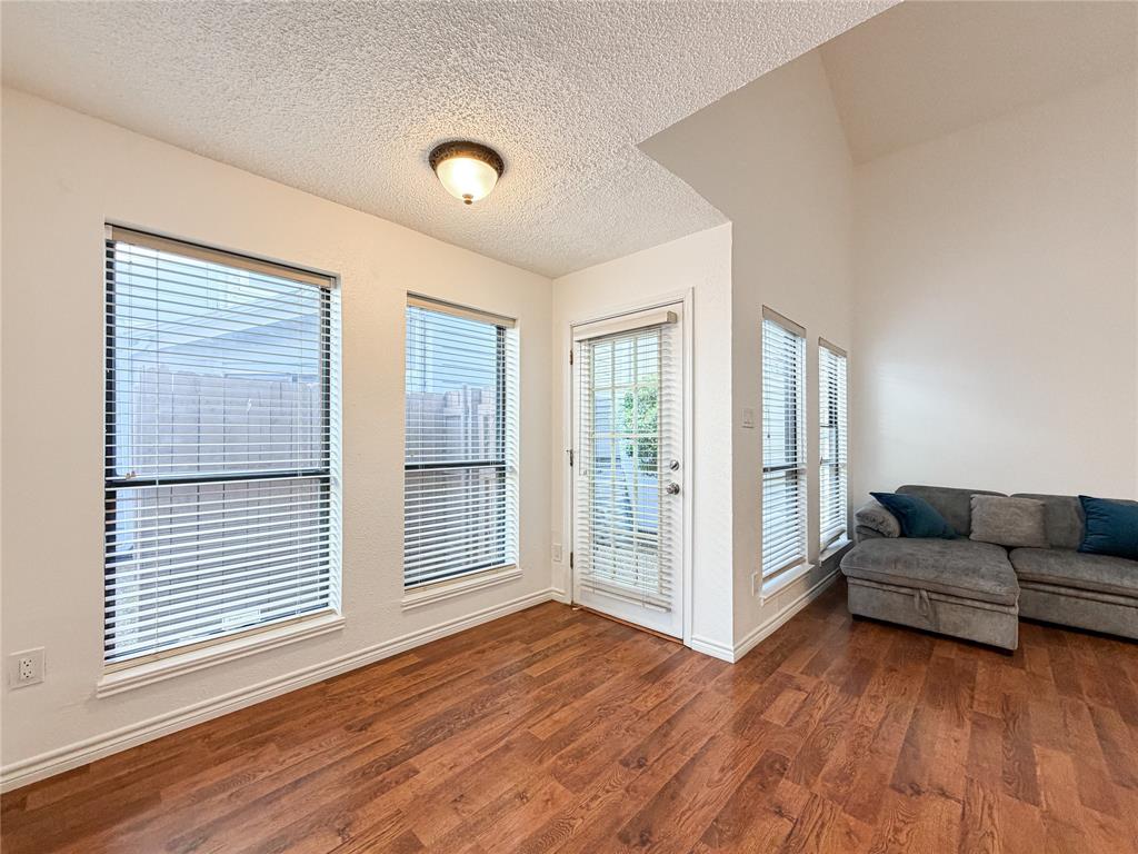17490 Meandering Way, Unit 1102 Dallas, TX 75252 - Photo 8 of 40 a view of livingroom with furniture and wooden floor