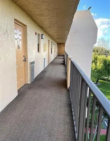 a bathroom with a sink toilet and a mirror