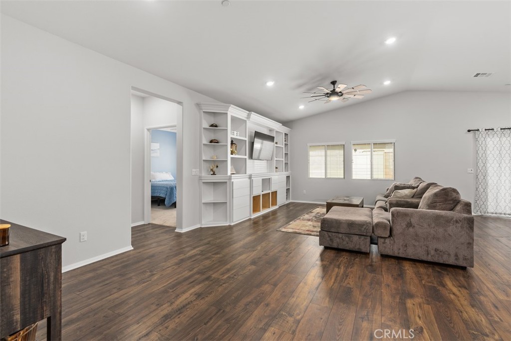 28471 Cosmos Drive Winchester, CA 92596 - Photo 14 of 27 a living room with furniture and a wooden floor
