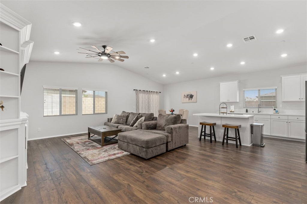 28471 Cosmos Drive Winchester, CA 92596 - Photo 15 of 27 a living room with furniture and wooden floor