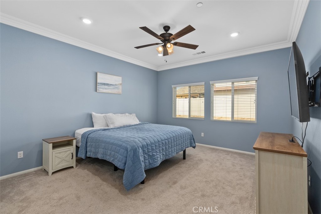 28471 Cosmos Drive Winchester, CA 92596 - Photo 22 of 27 a bedroom with a bed and window
