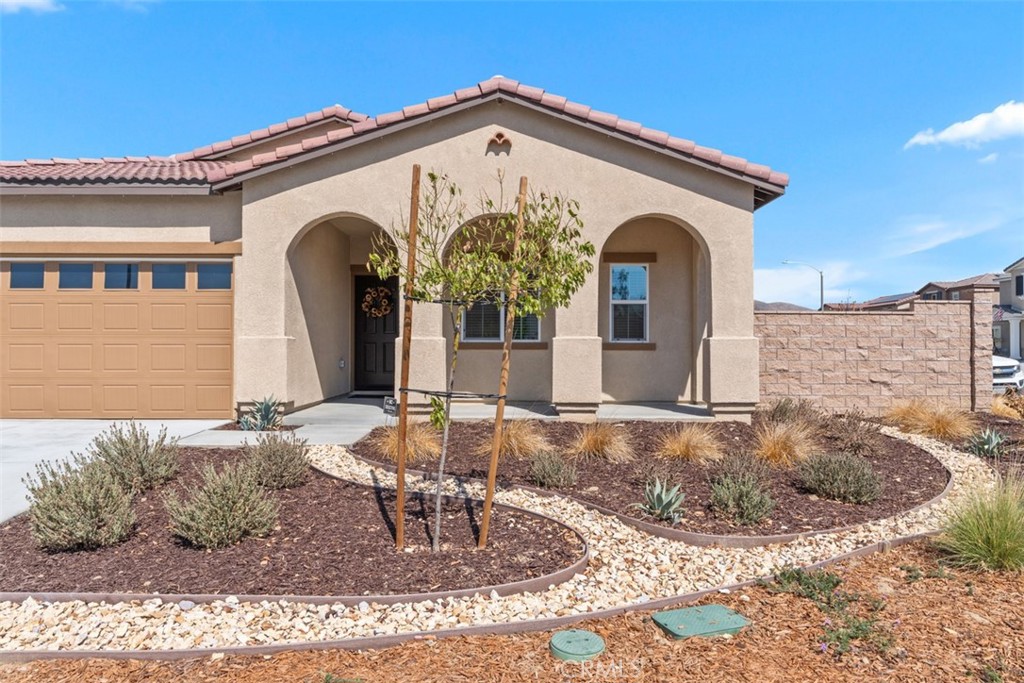 28471 Cosmos Drive Winchester, CA 92596 - Photo 4 of 27 a front view of a house