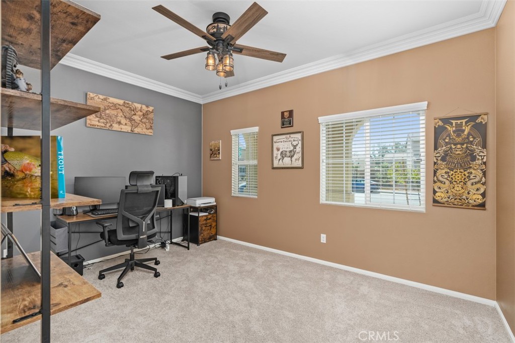 28471 Cosmos Drive Winchester, CA 92596 - Photo 8 of 27 a view of a workspace with furniture and a window
