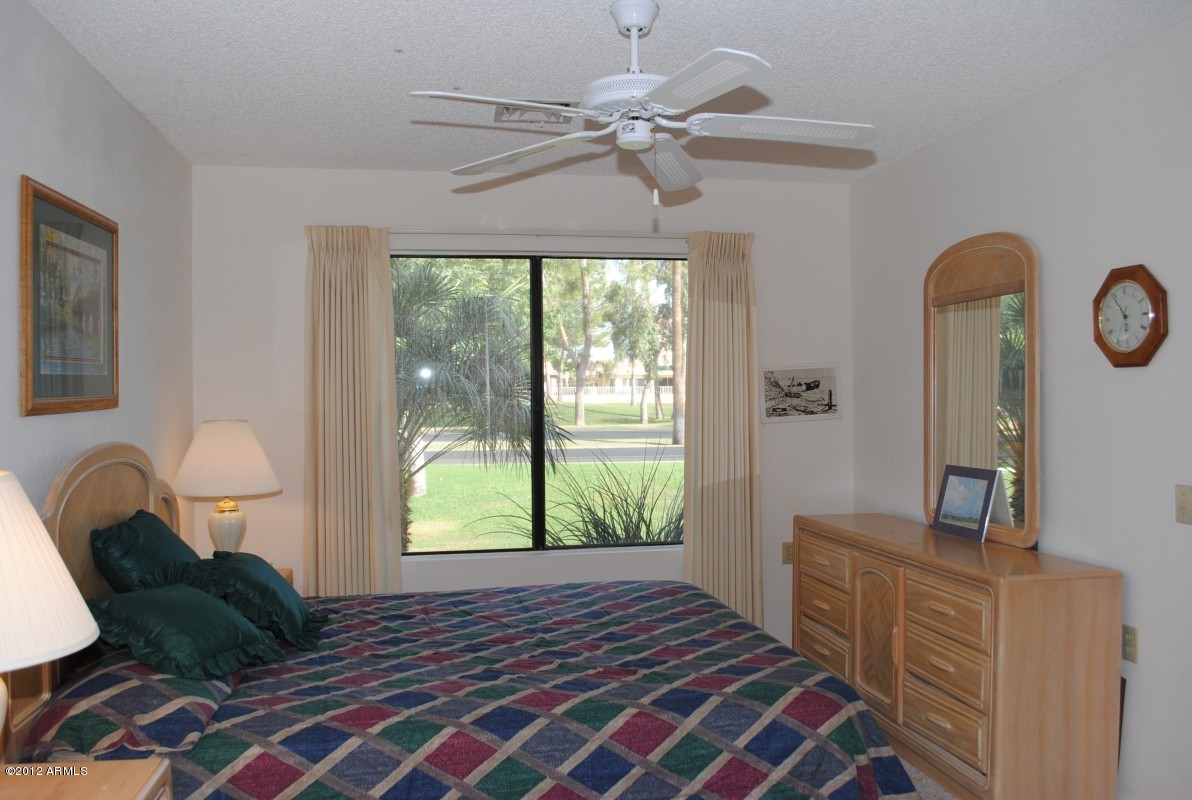 14300 West Bell Road, Unit 36 Surprise, AZ 85374 - Photo 8 of 14 master Bedroom