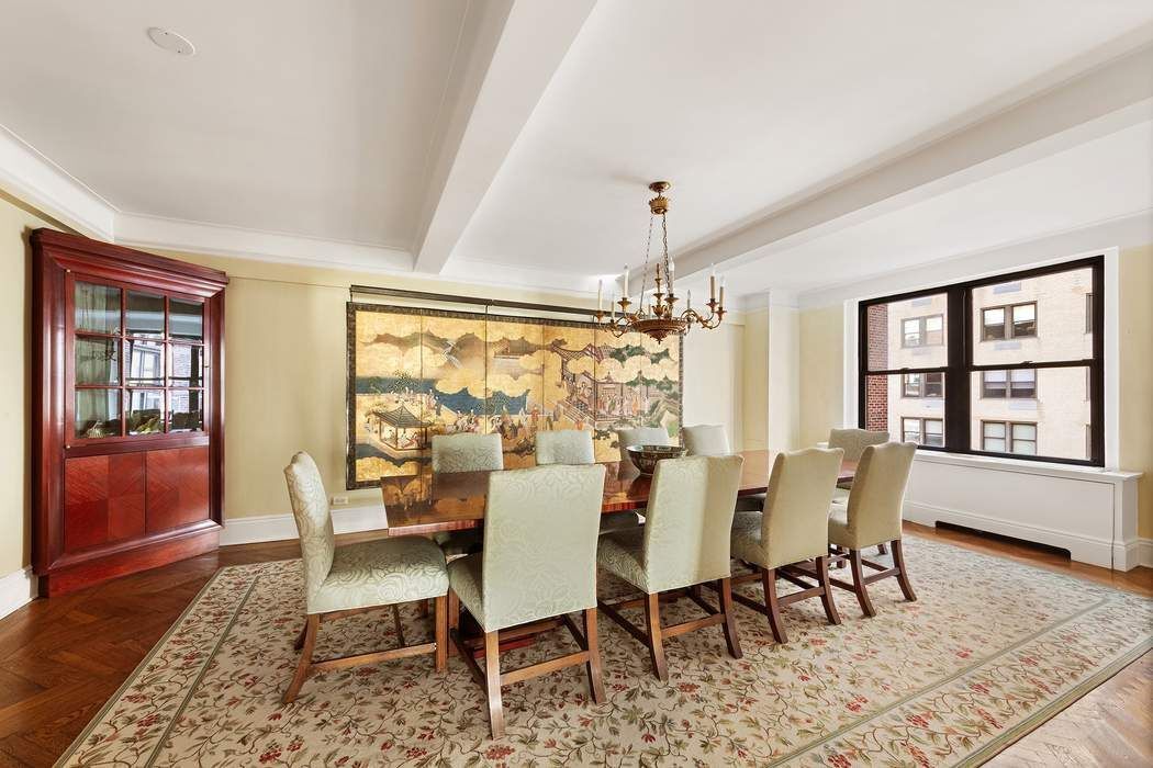 47 East 88th Street, Unit 8A Manhattan, NY 10128 - Photo 8 of 27 a view of a dining room with furniture window and wooden floor