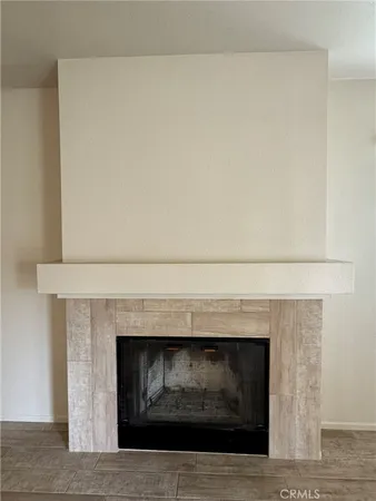 a fireplace with a hallway