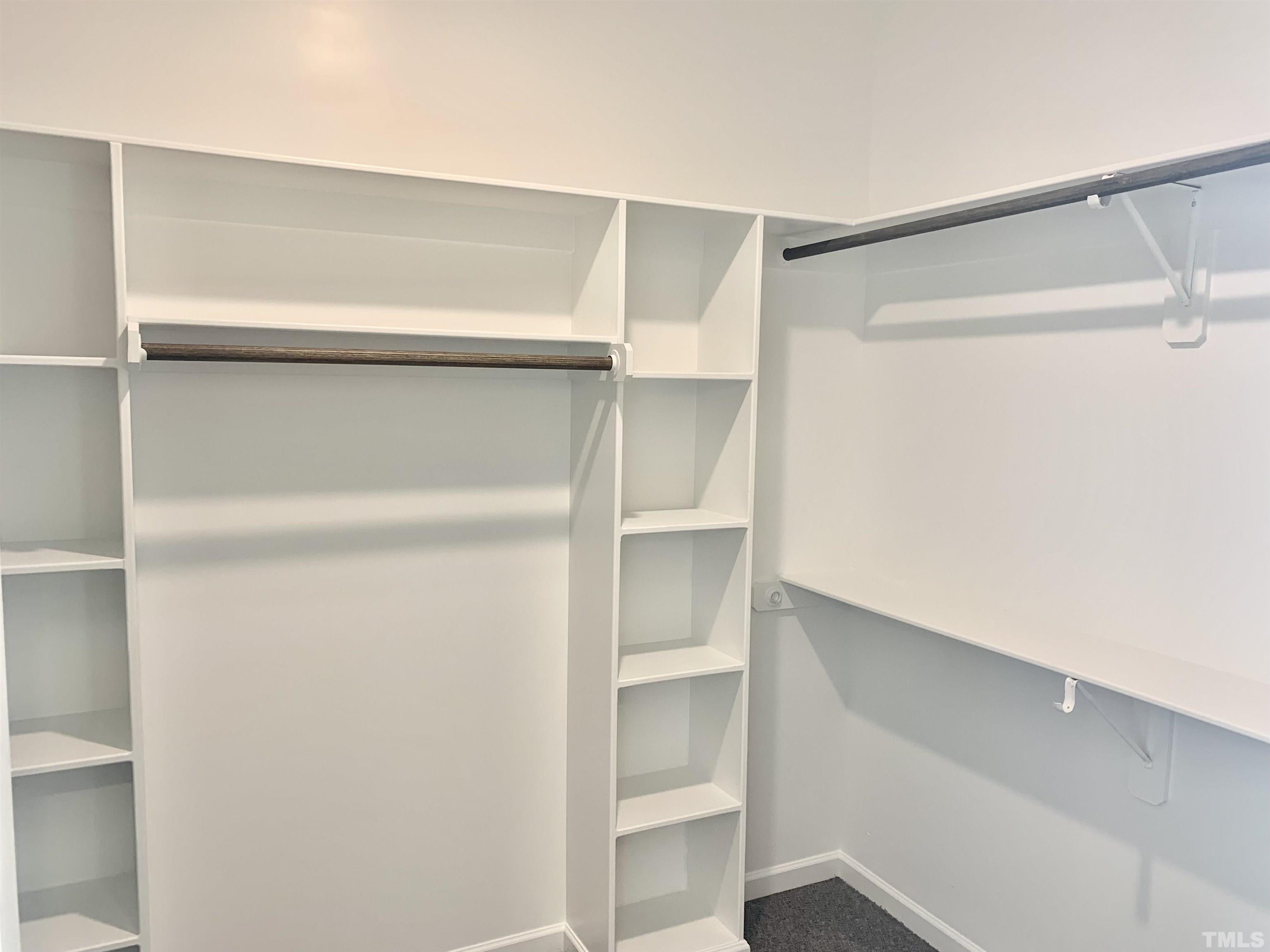 106 Two Daughters Streme Smithfield, NC 27577 - Photo 6 of 14 a view of an empty walk in closet