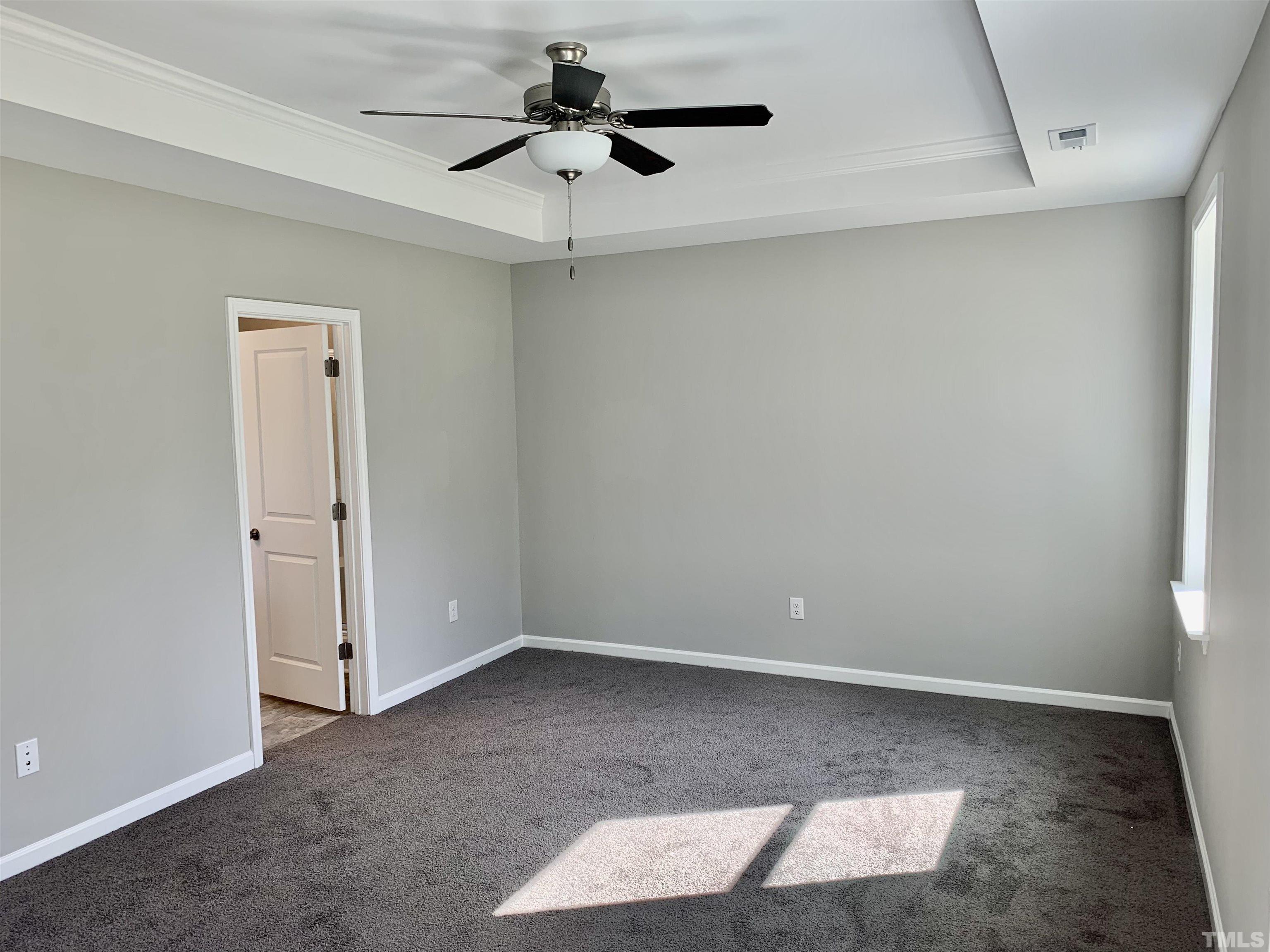 106 Two Daughters Streme Smithfield, NC 27577 - Photo 7 of 14 wooden floor in an empty room