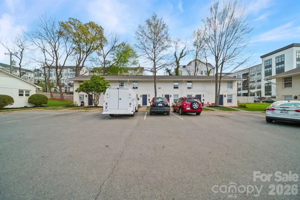 a cars parked in front of a building