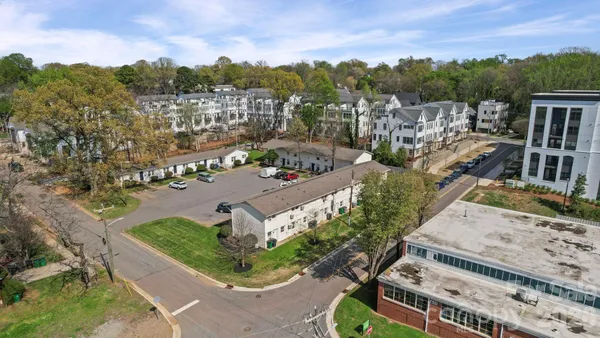 an aerial view of a house with a garden