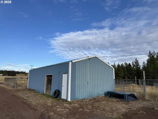 a backyard of house with seating space
