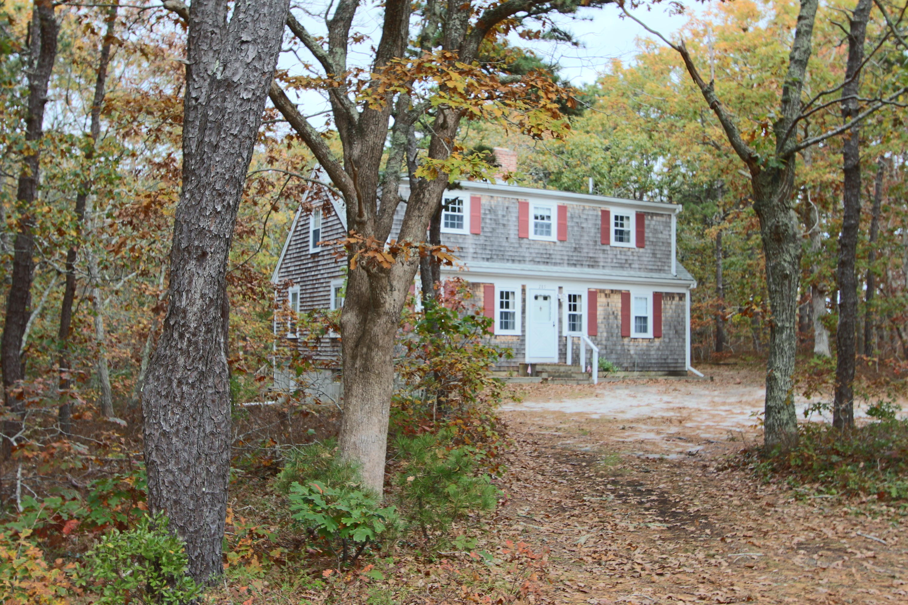 285 Long Pond Road Wellfleet, MA 02667 - Photo 1 of 28 a front view of a house with garden