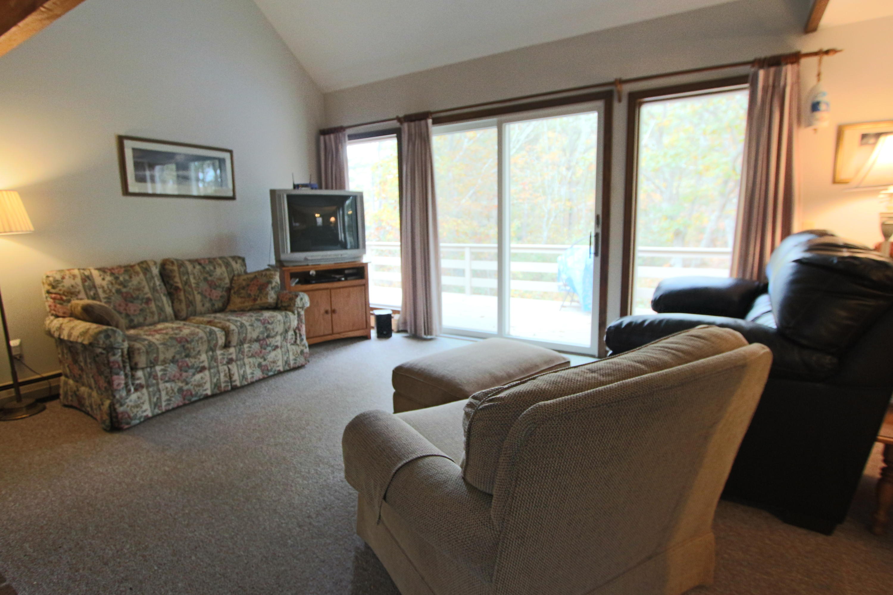 285 Long Pond Road Wellfleet, MA 02667 - Photo 7 of 28 a living room with furniture and a window
