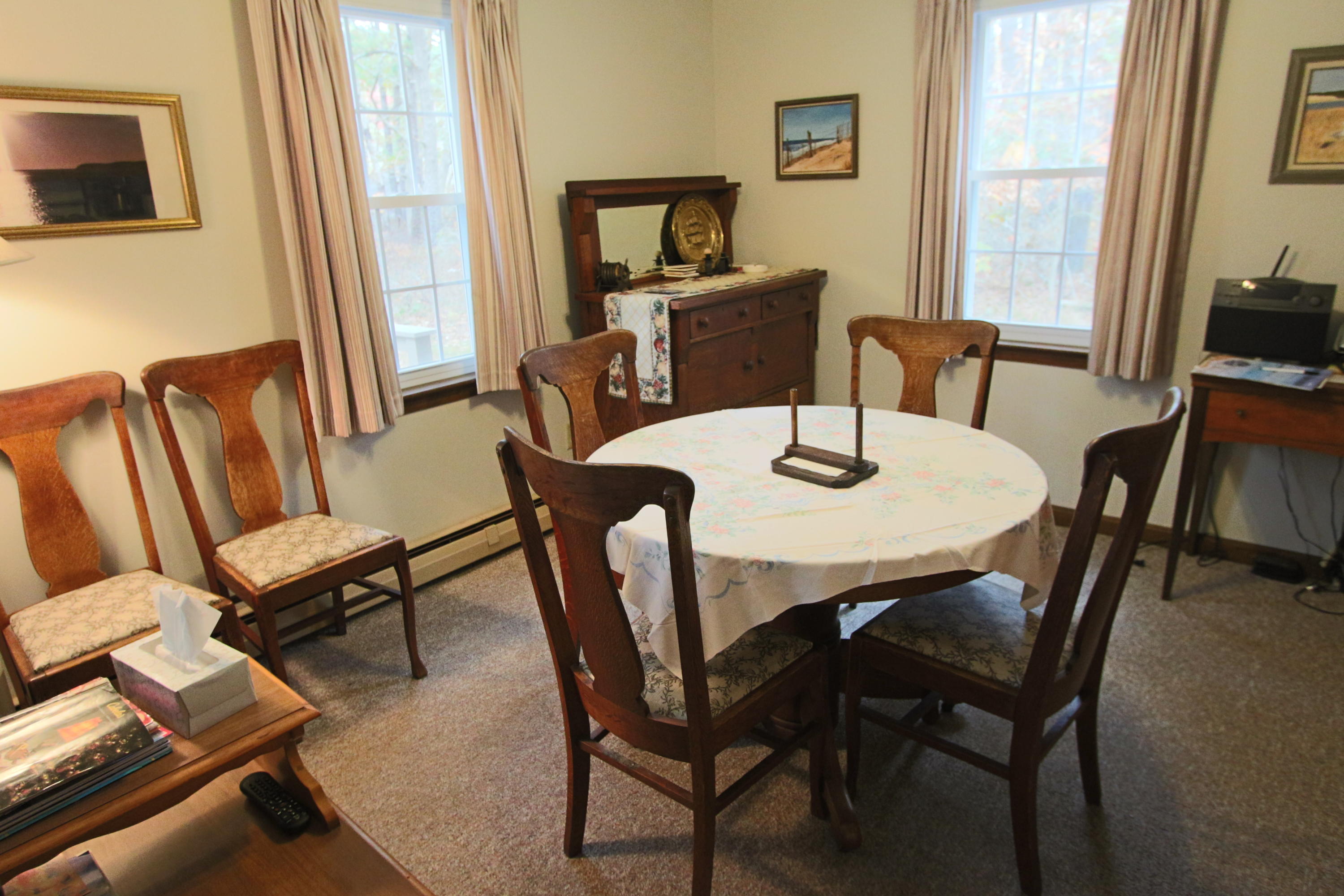 285 Long Pond Road Wellfleet, MA 02667 - Photo 9 of 28 a view of a dining room with furniture and a window