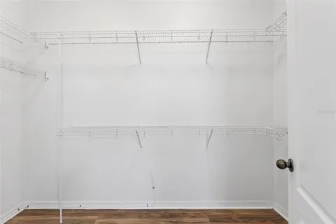 a view of entryway and hall with a living room