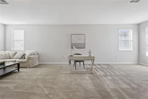 a bedroom with a bed and a fireplace