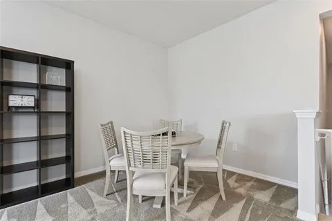 a bedroom with a bed and cabinet