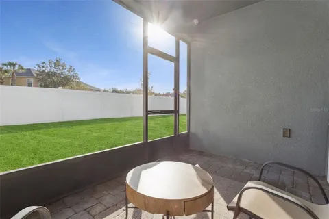 a front view of a house with a garden and yard