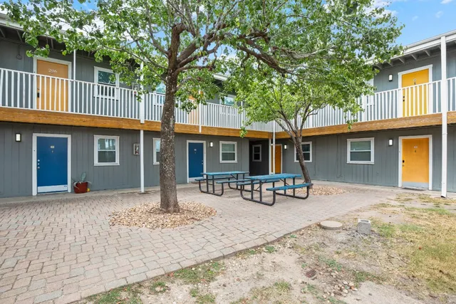 a front view of a house with patio