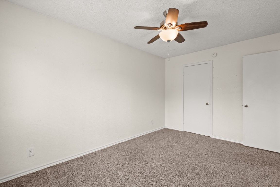 2401 Manor Road, Unit 206 Austin, TX 78722 - Photo 10 of 17 a view of room with ceiling fan