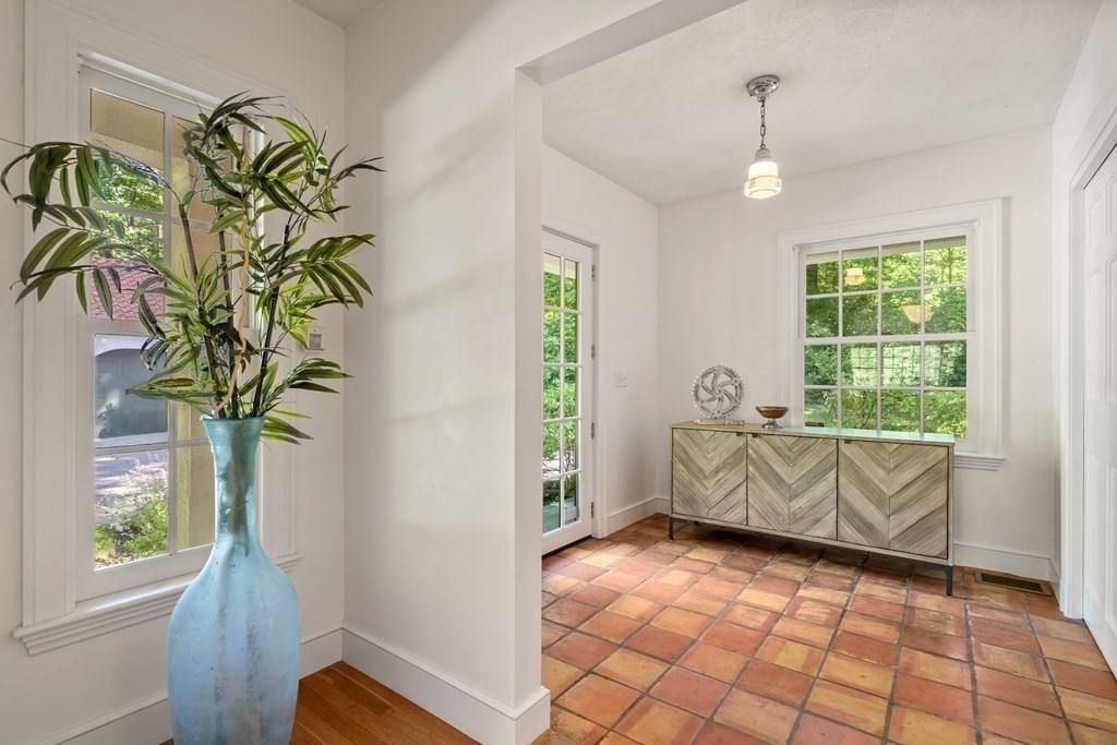 593 Peakham Road Sudbury, MA 01776 - Photo 28 of 42 a living room with furniture and a window