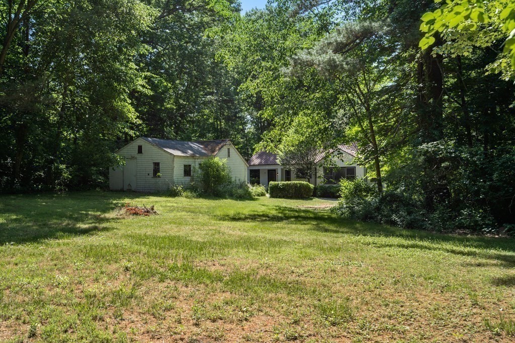 593 Peakham Road Sudbury, MA 01776 - Photo 31 of 42 a view of a house with a yard