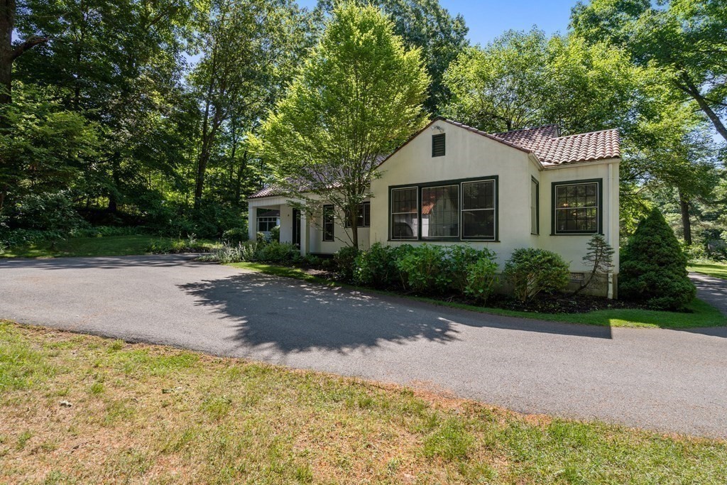 593 Peakham Road Sudbury, MA 01776 - Photo 32 of 42 a house view with a garden space
