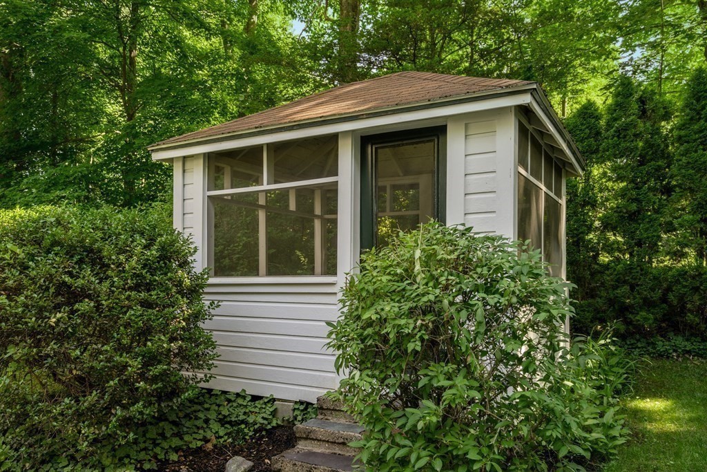 593 Peakham Road Sudbury, MA 01776 - Photo 34 of 42 a view of a house with a yard