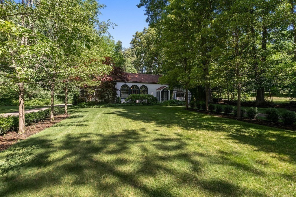 593 Peakham Road Sudbury, MA 01776 - Photo 37 of 42 a view of a house with a yard