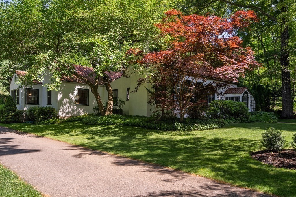 593 Peakham Road Sudbury, MA 01776 - Photo 38 of 42 a front view of a house with a yard