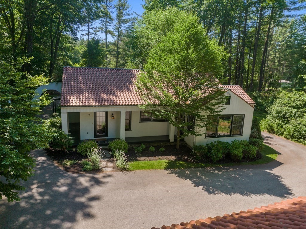 593 Peakham Road Sudbury, MA 01776 - Photo 39 of 42 a front view of a house with garden