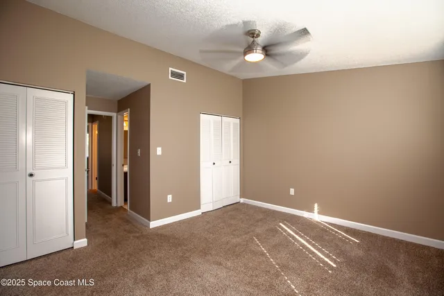 a view of a room with a bathroom