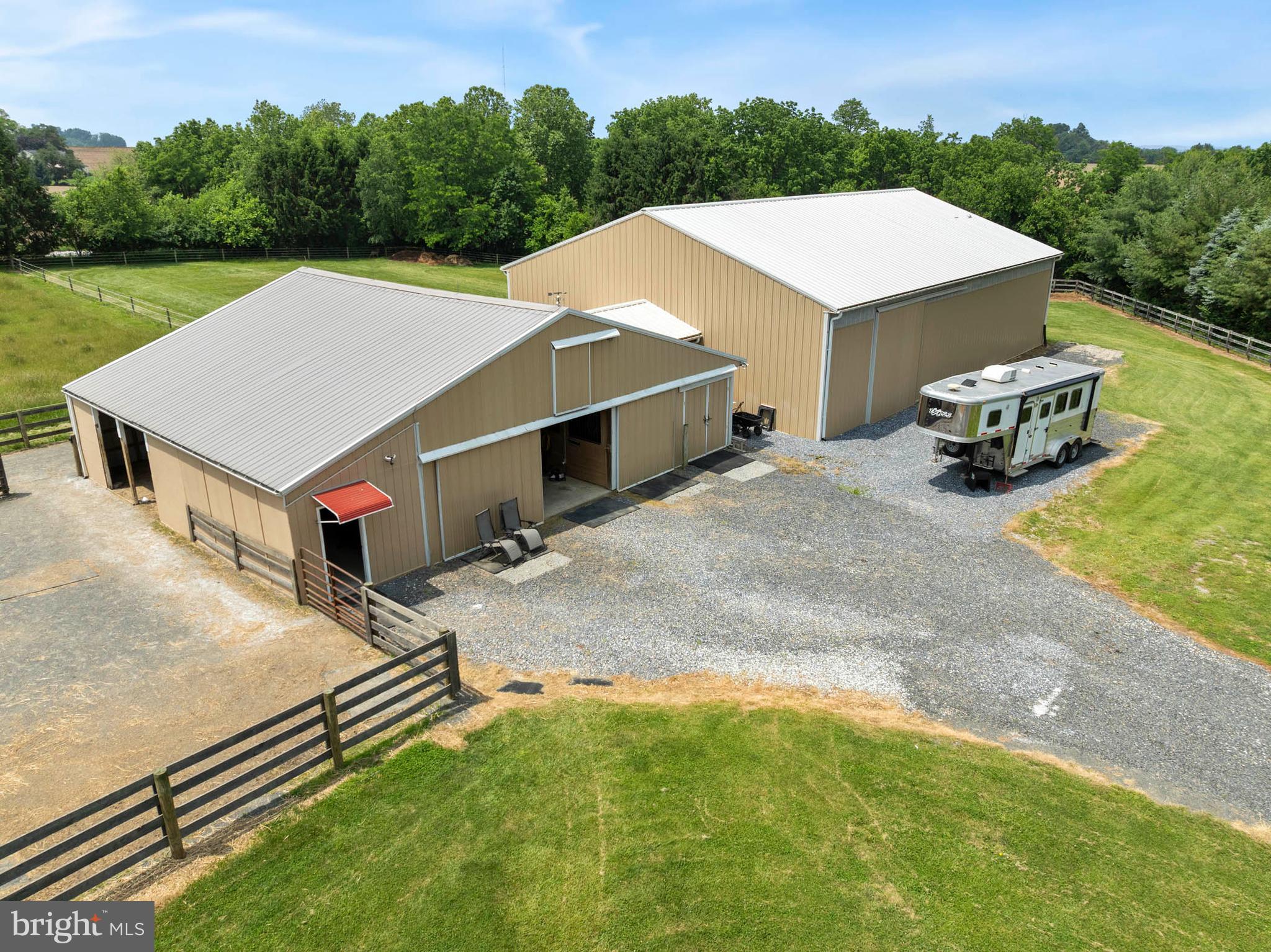 1392 Wakefield Valley Road New Windsor, MD 21776 - Photo 6 of 144 Center aisle barn, indoor ring, mud free paddocks