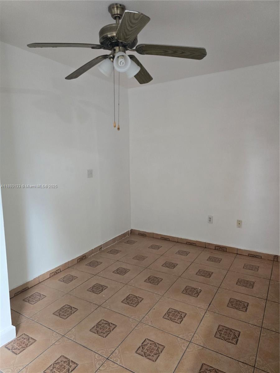 4716 Southwest 1st Street, Unit A Miami, FL 33134 - Photo 4 of 5 a view of a room with a fan