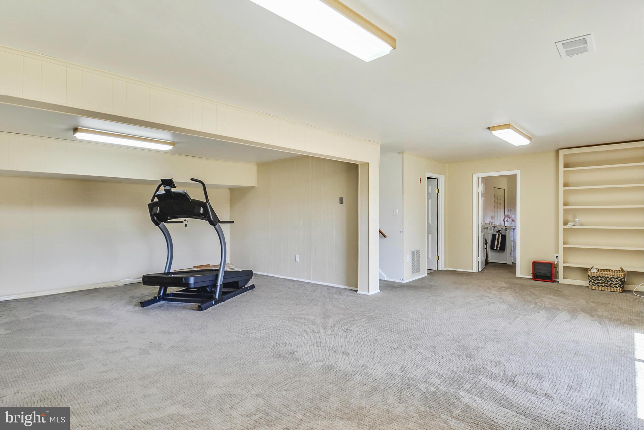 617 Windmill Lane Silver Spring, MD 20905 - Photo 16 of 20 a view of a room with gym equipment