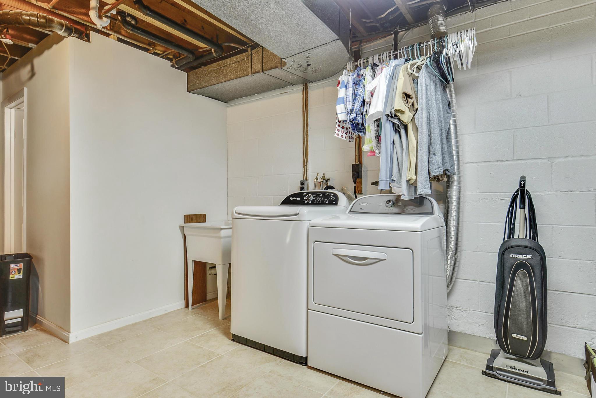 617 Windmill Lane Silver Spring, MD 20905 - Photo 17 of 20 a view of walk in closet with clothes