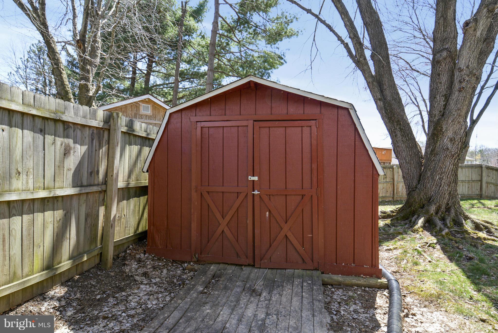 617 Windmill Lane Silver Spring, MD 20905 - Photo 20 of 20 a view of barn with wooden fence
