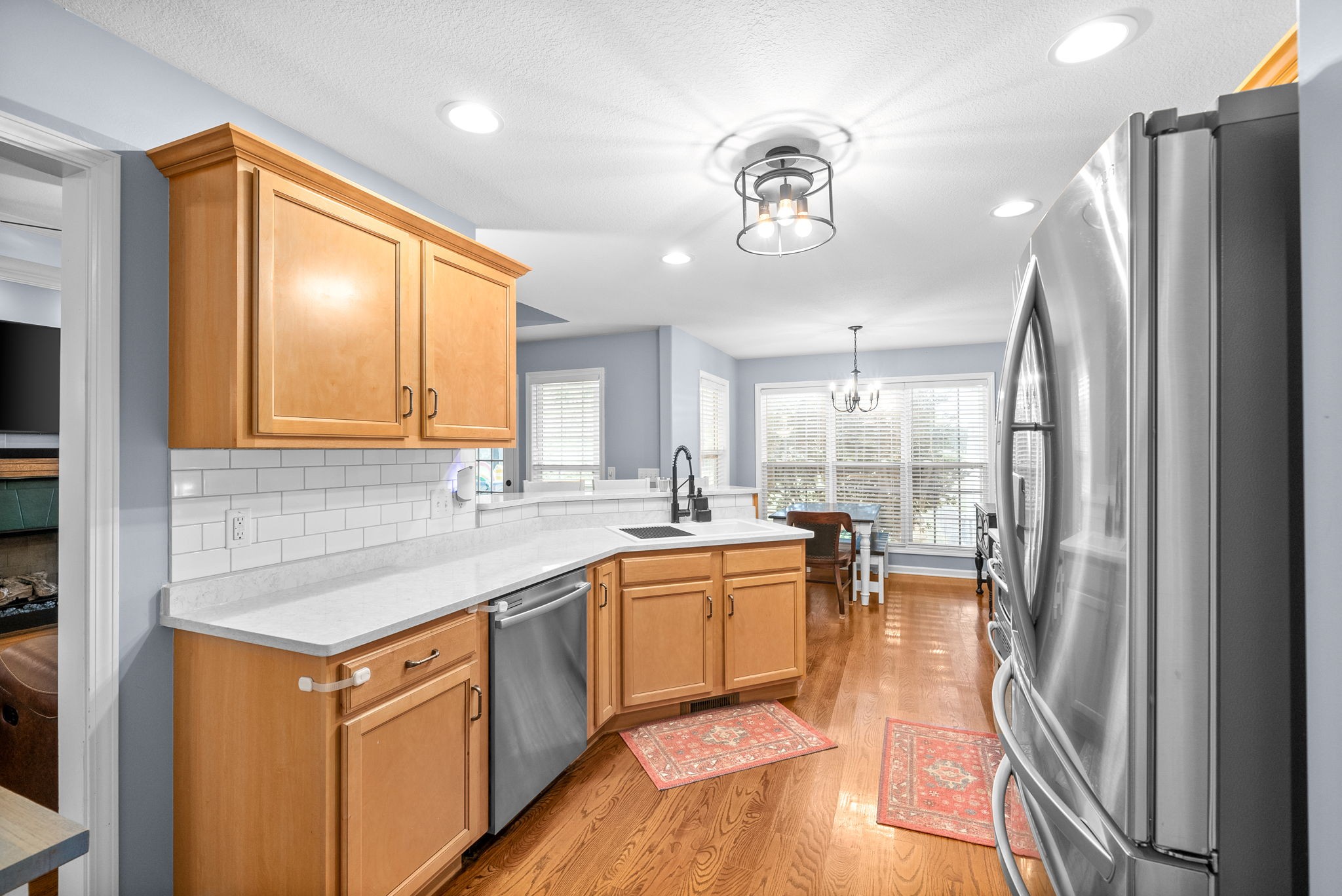 1221 Olive Branch Road Clarksville, TN 37042 - Photo 13 of 36 a kitchen with stainless steel appliances granite countertop a sink a stove and a refrigerator
