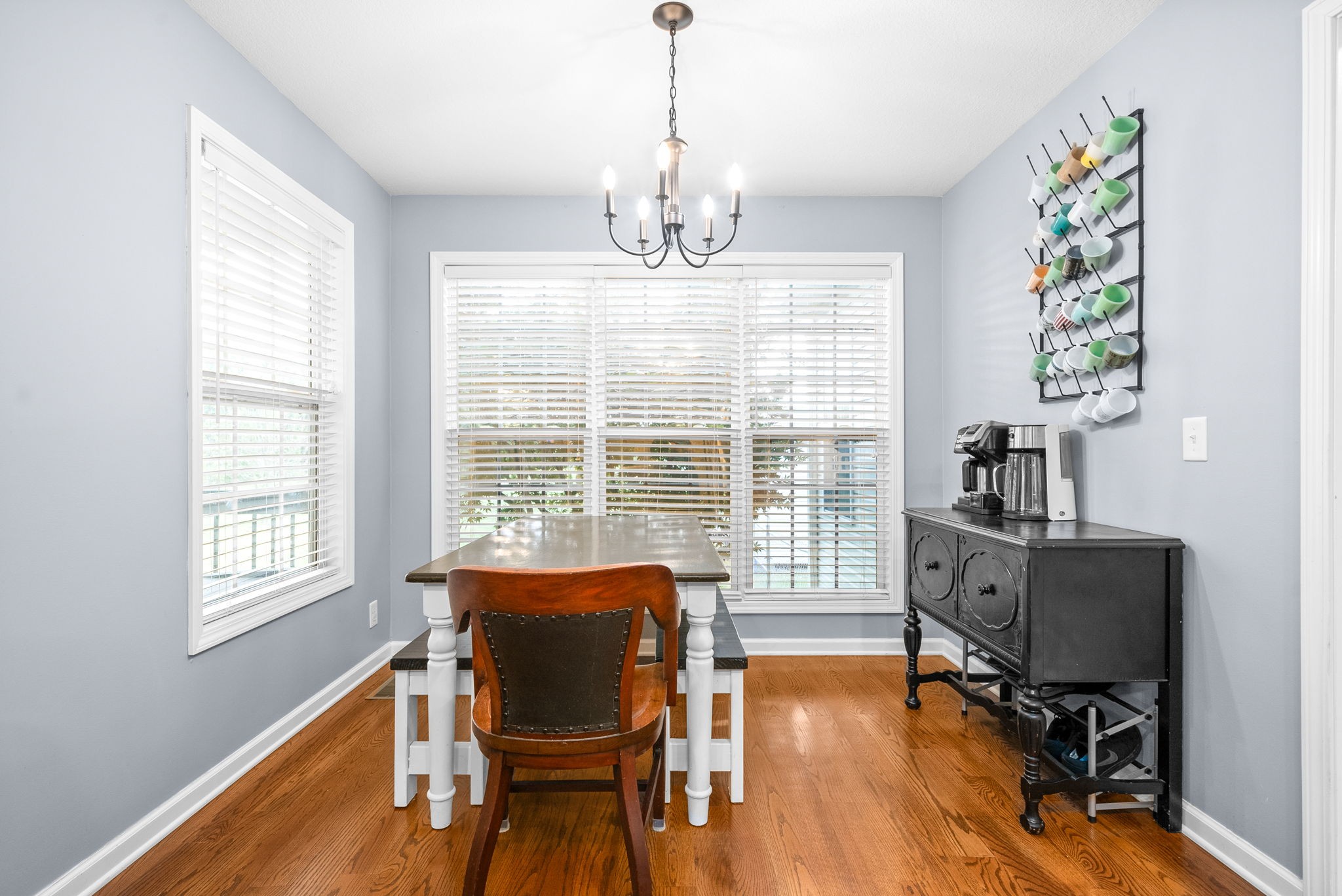 1221 Olive Branch Road Clarksville, TN 37042 - Photo 16 of 36 a view of a dining room with furniture window and wooden floor