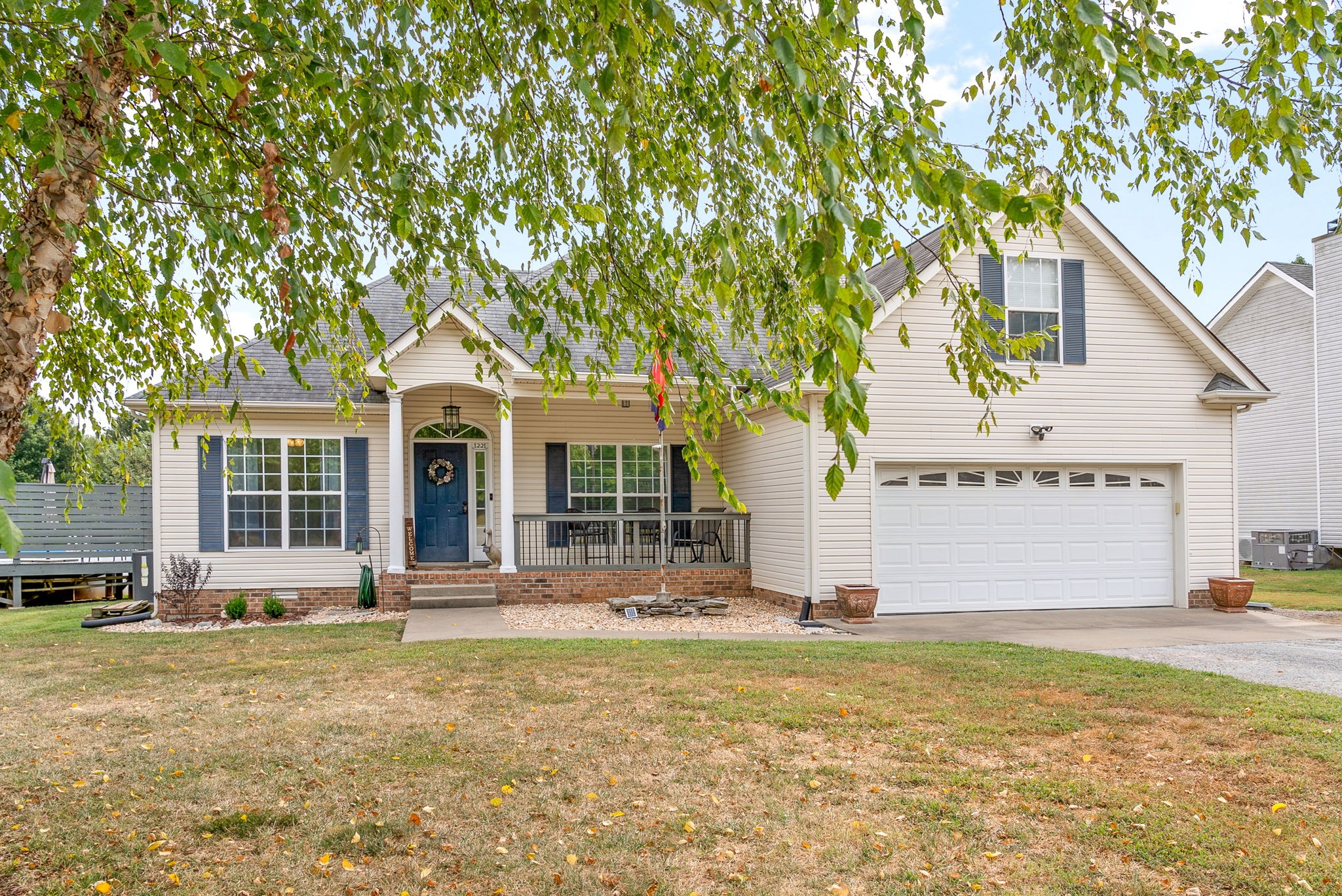 1221 Olive Branch Road Clarksville, TN 37042 - Photo 2 of 36 a front view of a house with a garden