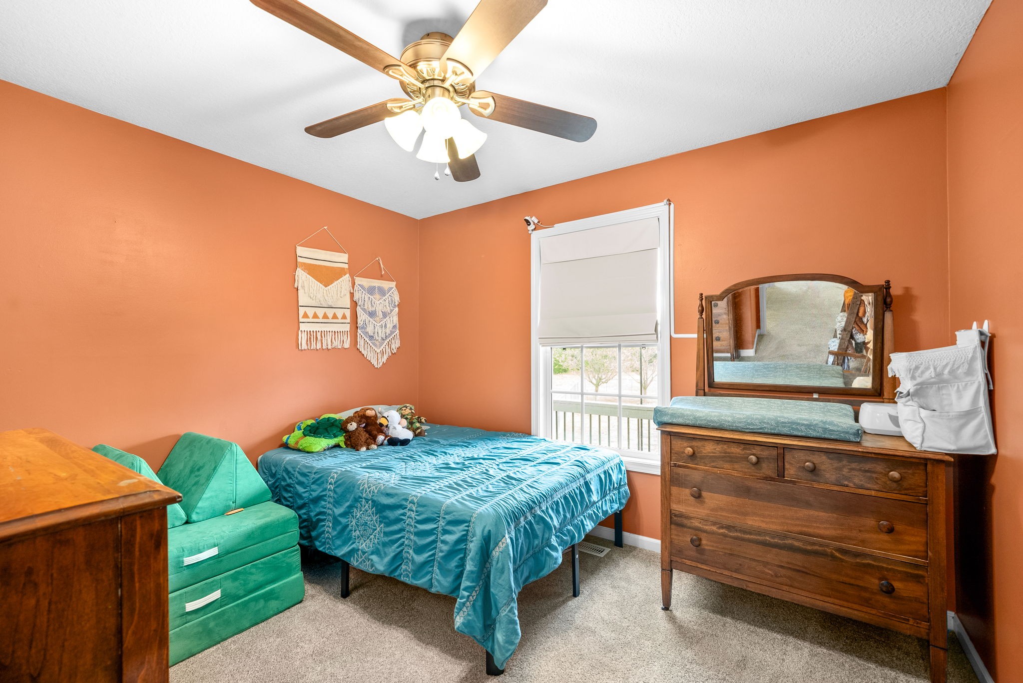 1221 Olive Branch Road Clarksville, TN 37042 - Photo 22 of 36 a bedroom with a bed and a dresser
