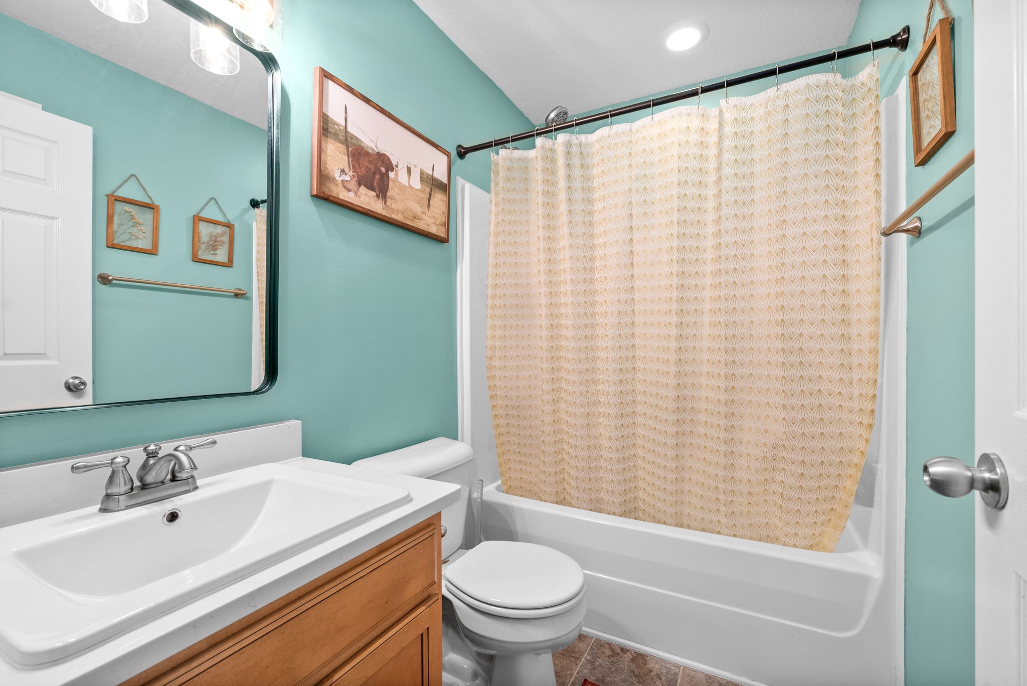 1221 Olive Branch Road Clarksville, TN 37042 - Photo 24 of 36 a bathroom with a sink a toilet and a mirror