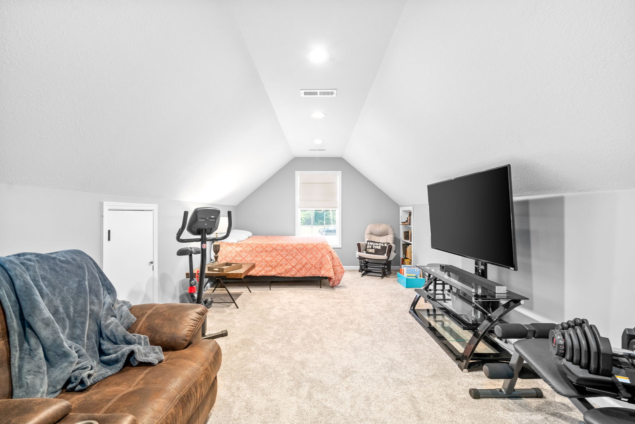 1221 Olive Branch Road Clarksville, TN 37042 - Photo 25 of 36 a bedroom with furniture and a flat screen tv