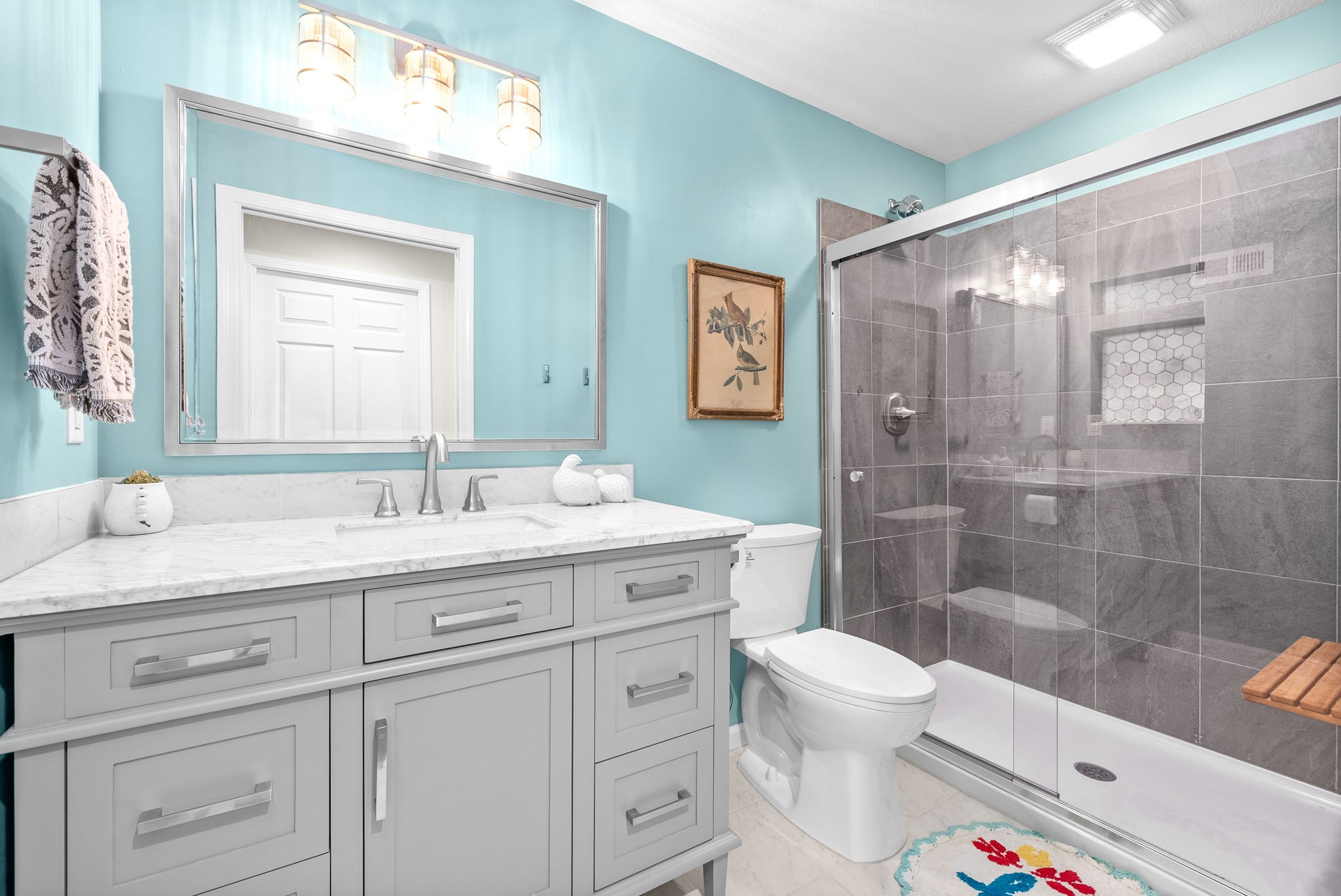 1221 Olive Branch Road Clarksville, TN 37042 - Photo 27 of 36 a bathroom with a granite countertop sink toilet and shower