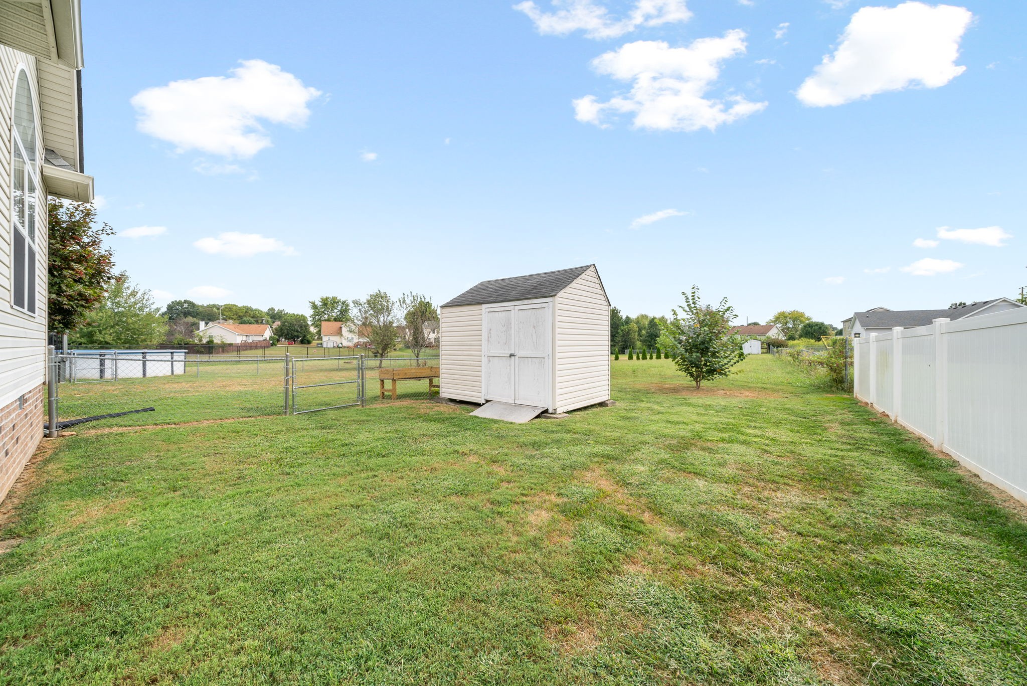 1221 Olive Branch Road Clarksville, TN 37042 - Photo 36 of 36 a backyard of a house with lots of green space