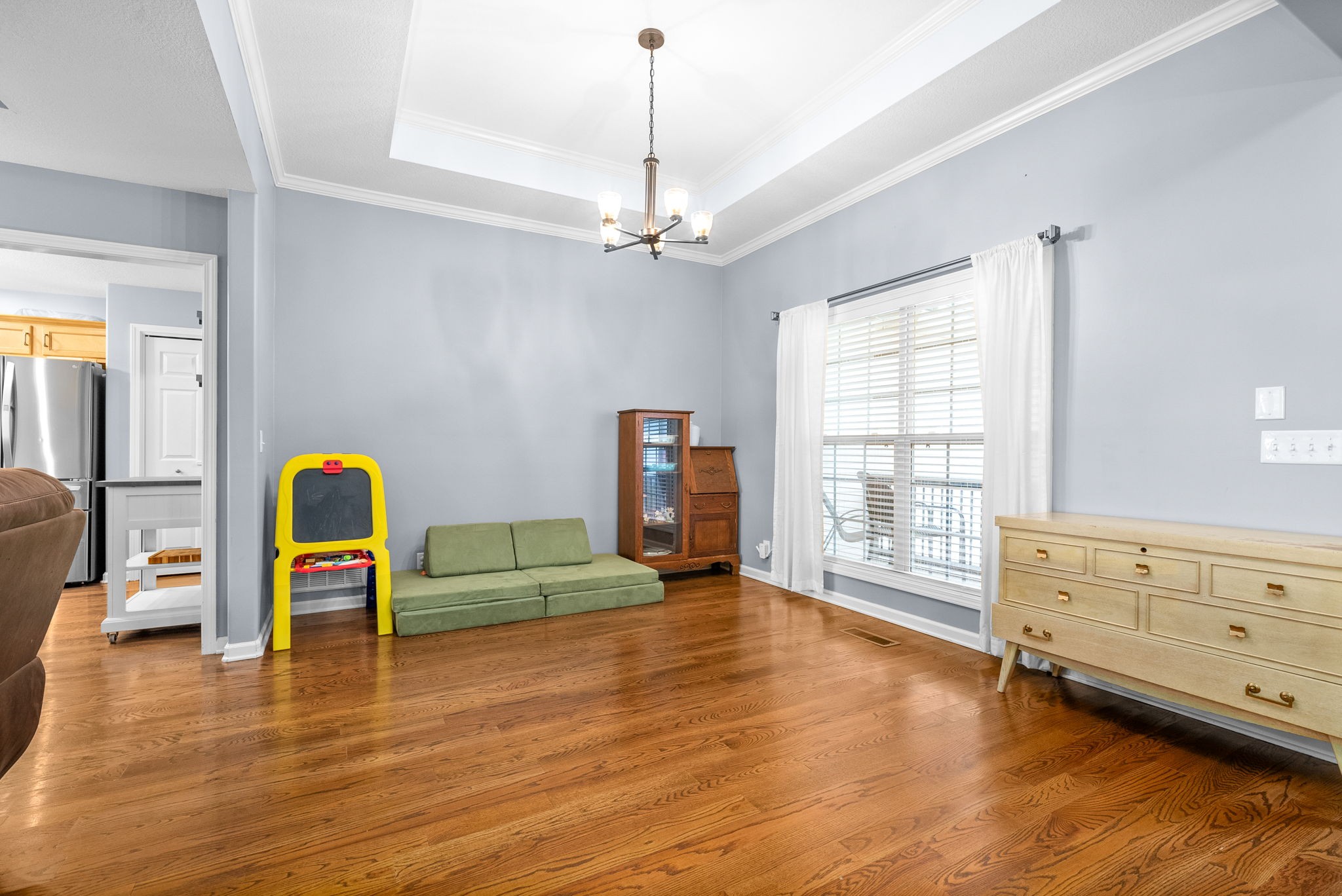 1221 Olive Branch Road Clarksville, TN 37042 - Photo 6 of 36 a bedroom with a bed and a dresser