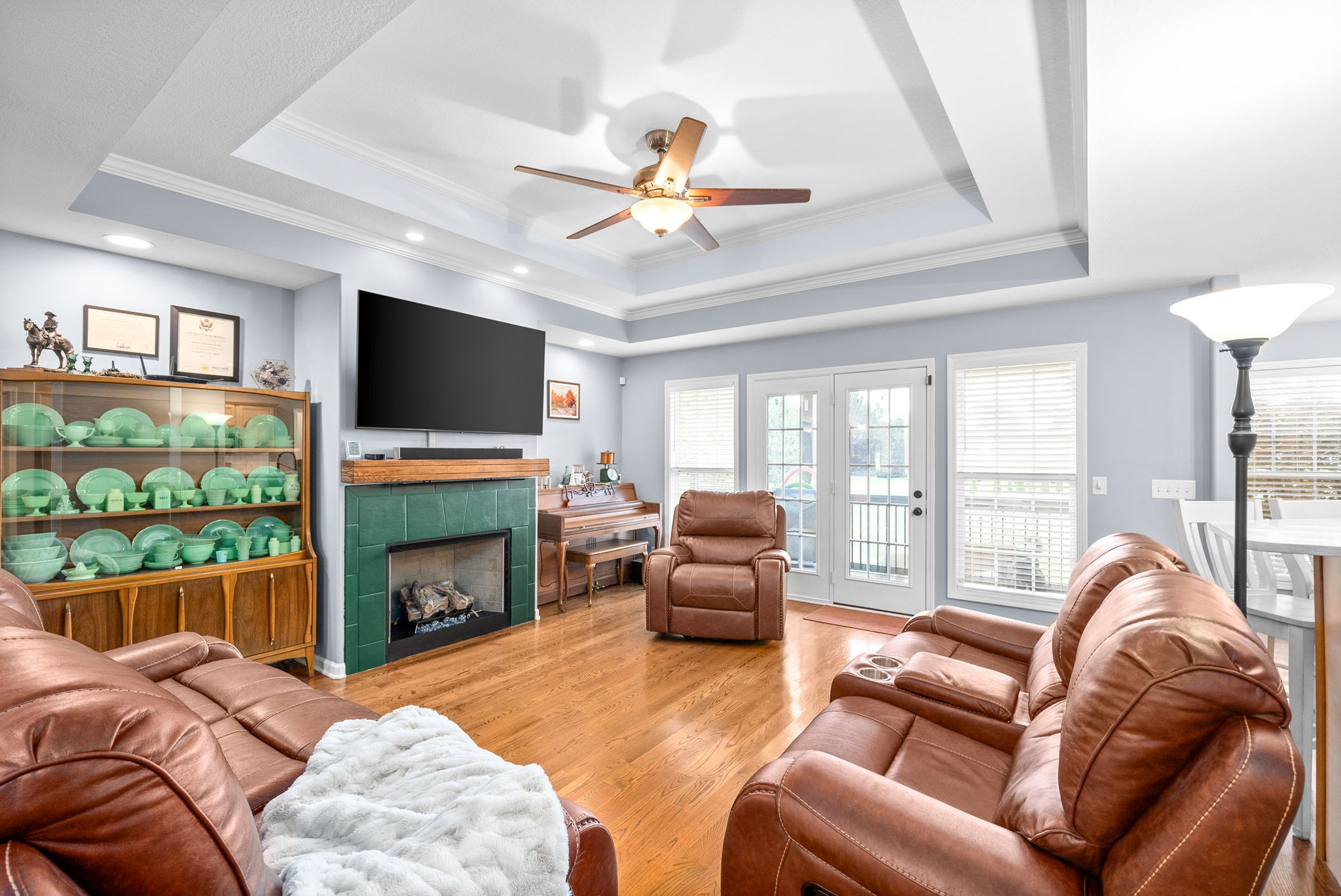 1221 Olive Branch Road Clarksville, TN 37042 - Photo 8 of 36 a living room with fireplace furniture and a flat screen tv