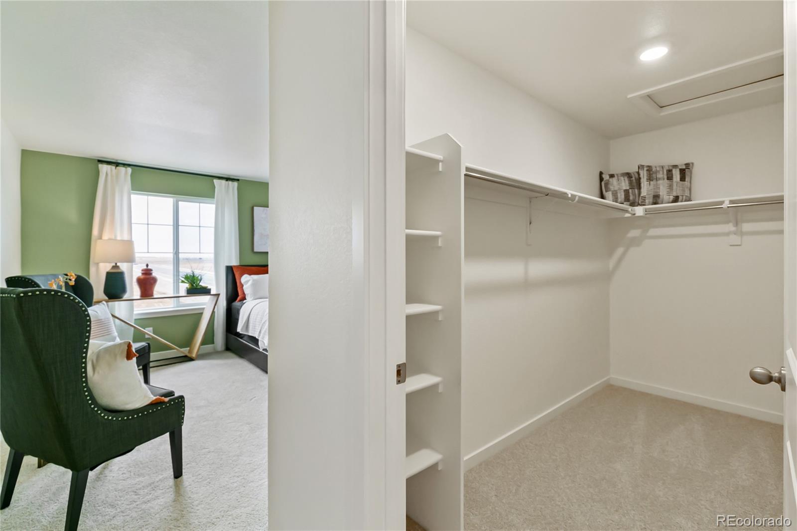 9935 Ceylon Court Commerce City, CO 80022 - Photo 25 of 44 a living room with furniture and a window