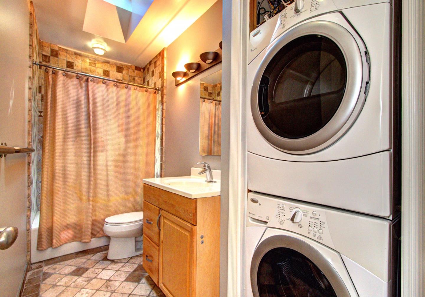 329 Middlefield Road Palo Alto, CA 94301 - Photo 6 of 7 a bathroom with a sink a toilet and a shower